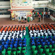 Students wearing traditional dresses